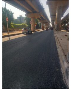 धूल प्रदूषण कम करने के लिए दिल्ली में सड़कें और फुटपाथ दुरुस्त कर रहा डीएमआरसी दिल्ली में मेट्रो के एलिवेटेड ढांचे के नीचे दोबारा बनाई गई सड़क